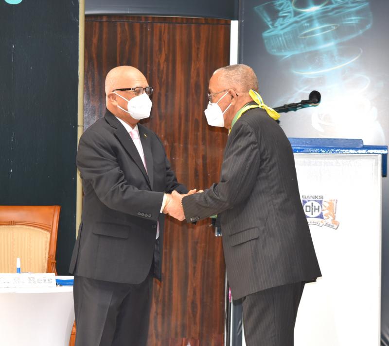 Mr. Andre Carto - Director receives his 20-Year Service Medal as a Director
