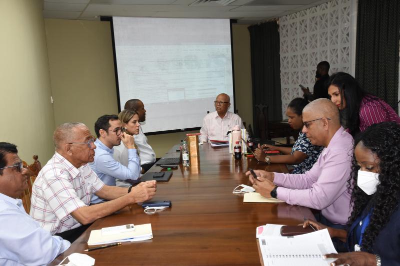 Mr. Clifford Reis chairs the meeting with the Coca Cola Executives
